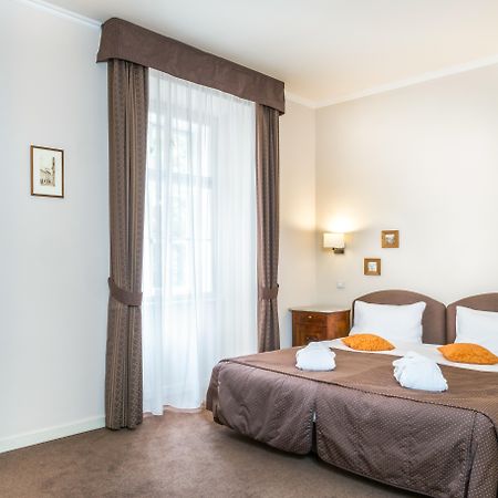 Hotel Bookquet Prague Exterior photo A room at the hotel