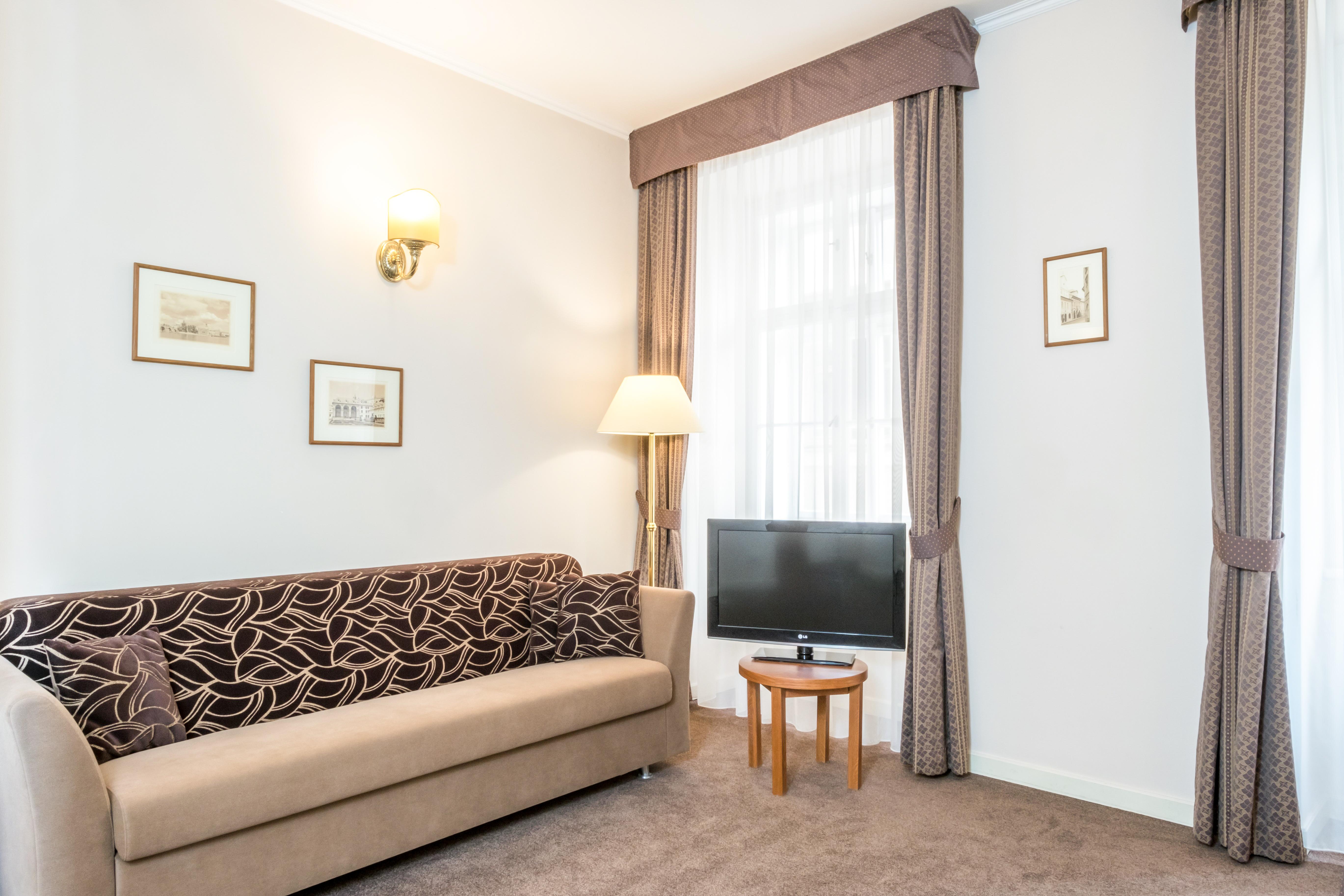 Hotel Bookquet Prague Exterior photo A living room at the hotel