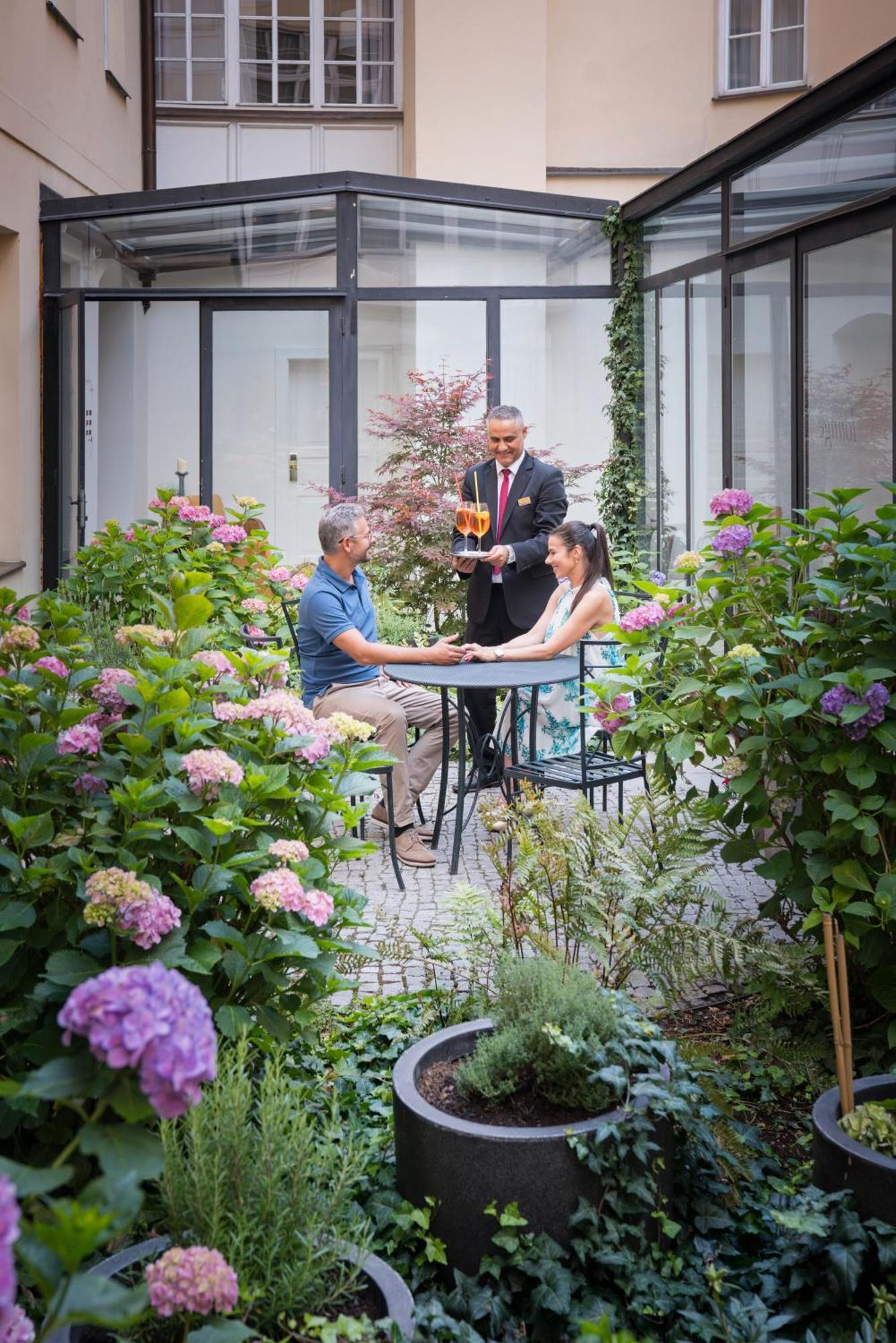 Hotel Bookquet Prague Exterior photo The hotel's garden