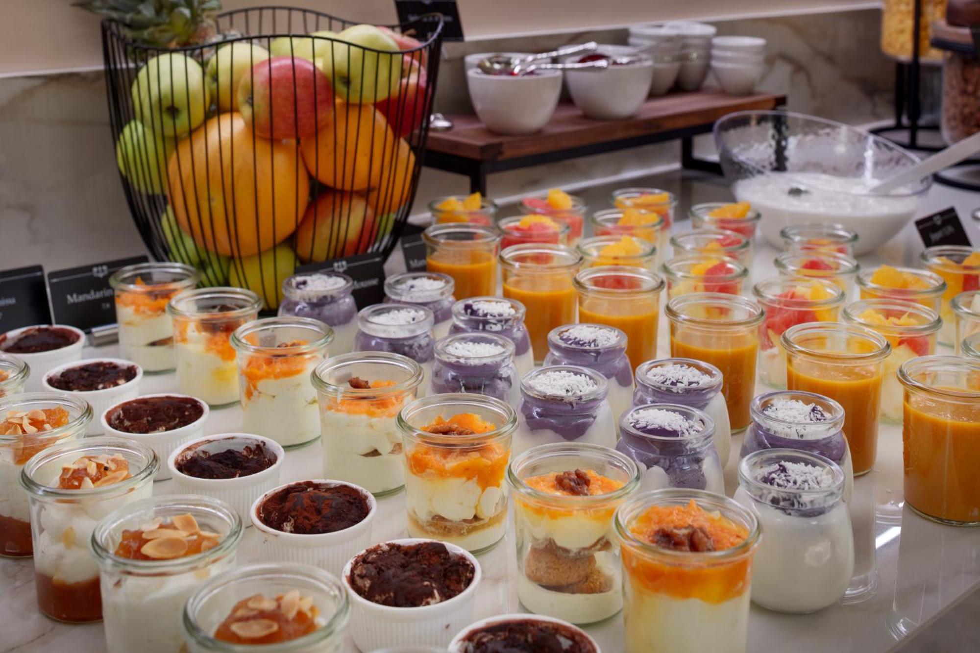 Hotel Bookquet Prague Exterior photo A selection of desserts